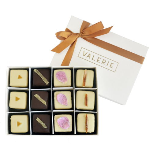 Assorted Petits Fours with gold ribbon
