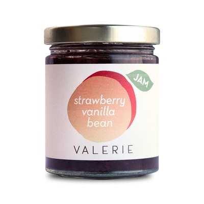 A 7-ounce jar of Strawberry Vanilla Bean Jam by Valerie Confections, featuring a minimalist label with a soft peach and red design. Handmade with fresh strawberries and real vanilla bean for a rich, aromatic flavor.